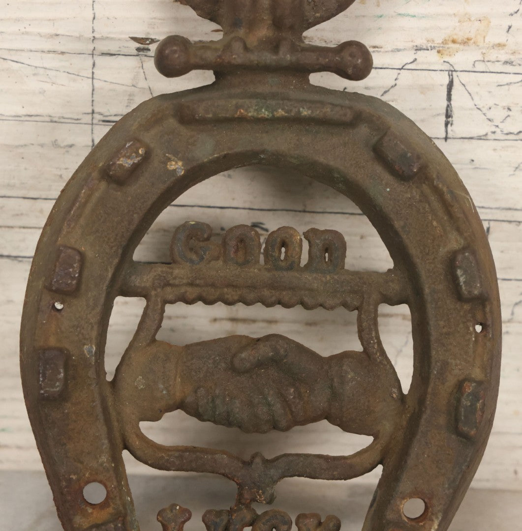 Lot 053 - Antique Cast Iron Horseshoe With Shaking Hands Motif, Eagle, "Good Luck," With Wall Mounting Holes