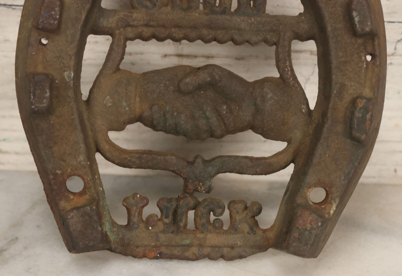 Lot 053 - Antique Cast Iron Horseshoe With Shaking Hands Motif, Eagle, "Good Luck," With Wall Mounting Holes