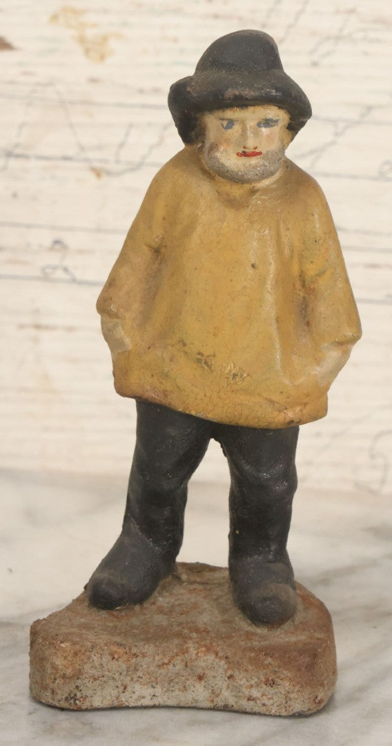 Lot 055 - Vintage Cast Iron Sailor In Yellow Rain Slicker Jacket Door Stop, Hand Painted, Solid