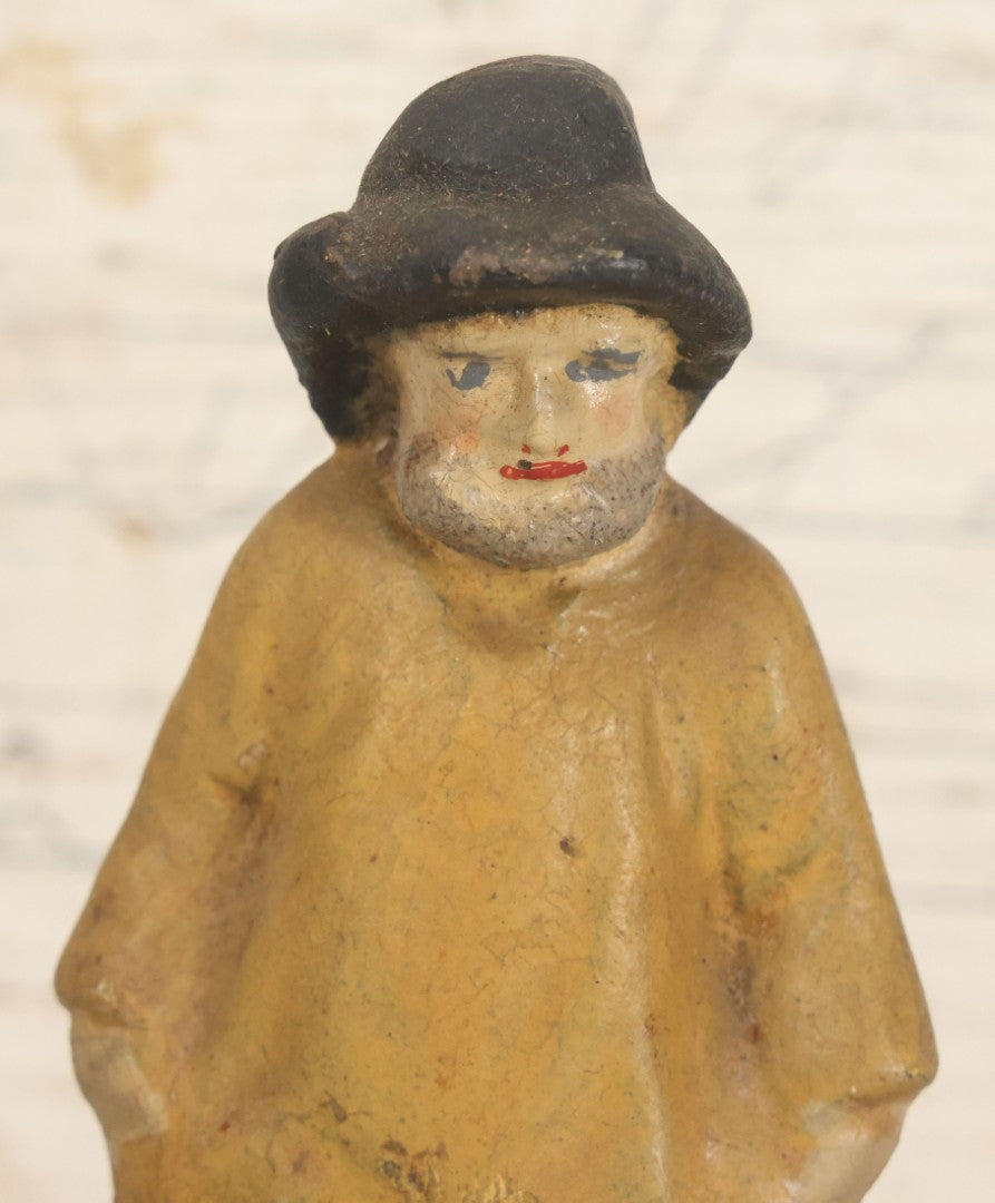 Lot 055 - Vintage Cast Iron Sailor In Yellow Rain Slicker Jacket Door Stop, Hand Painted, Solid