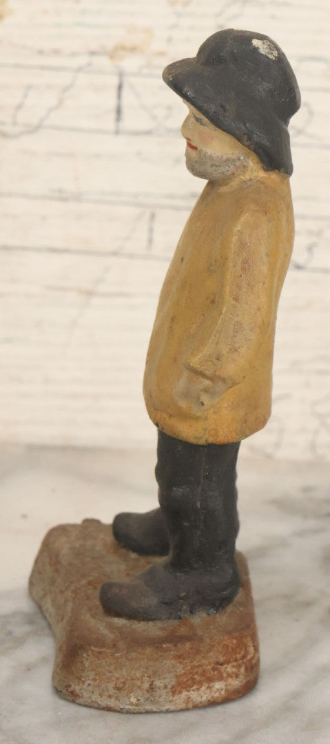 Lot 055 - Vintage Cast Iron Sailor In Yellow Rain Slicker Jacket Door Stop, Hand Painted, Solid
