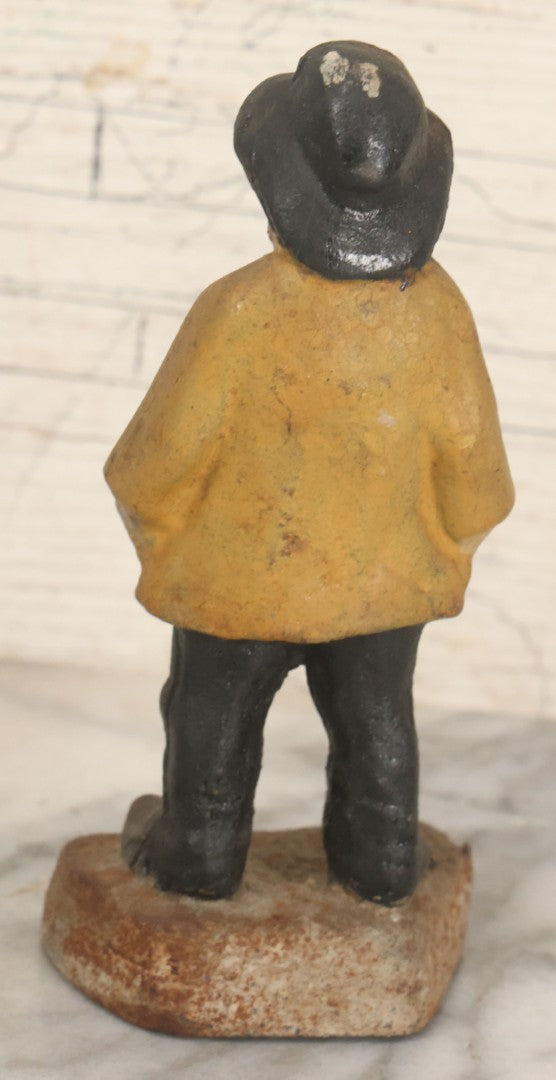 Lot 055 - Vintage Cast Iron Sailor In Yellow Rain Slicker Jacket Door Stop, Hand Painted, Solid