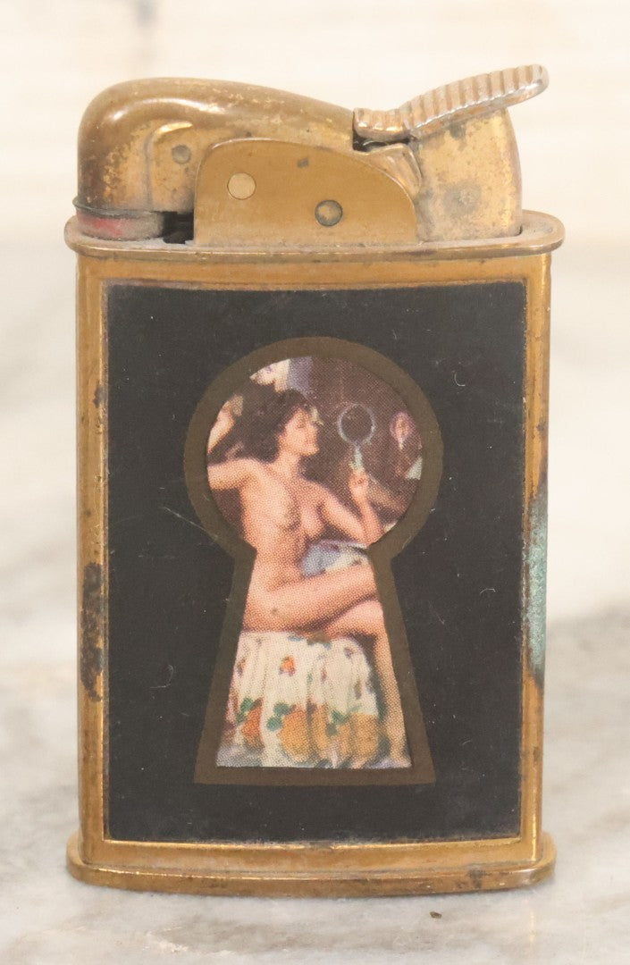 Lot 059 - Vintage Novelty Lighter With Nude Lady In Keyhole, New Flint, Sparks, Needs Fuel, Note Rust, By Evans, U.S. Patent 19023