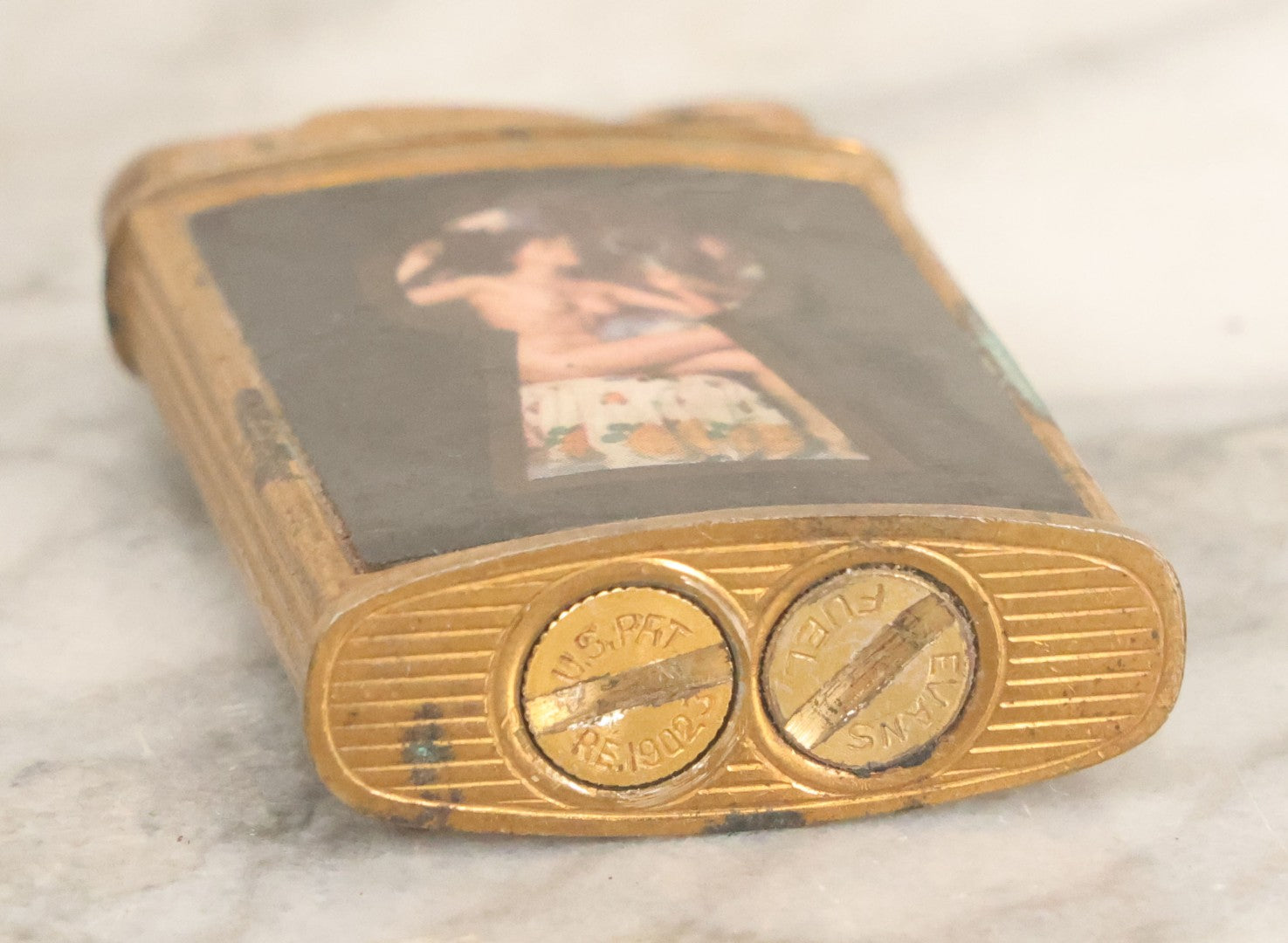 Lot 059 - Vintage Novelty Lighter With Nude Lady In Keyhole, New Flint, Sparks, Needs Fuel, Note Rust, By Evans, U.S. Patent 19023