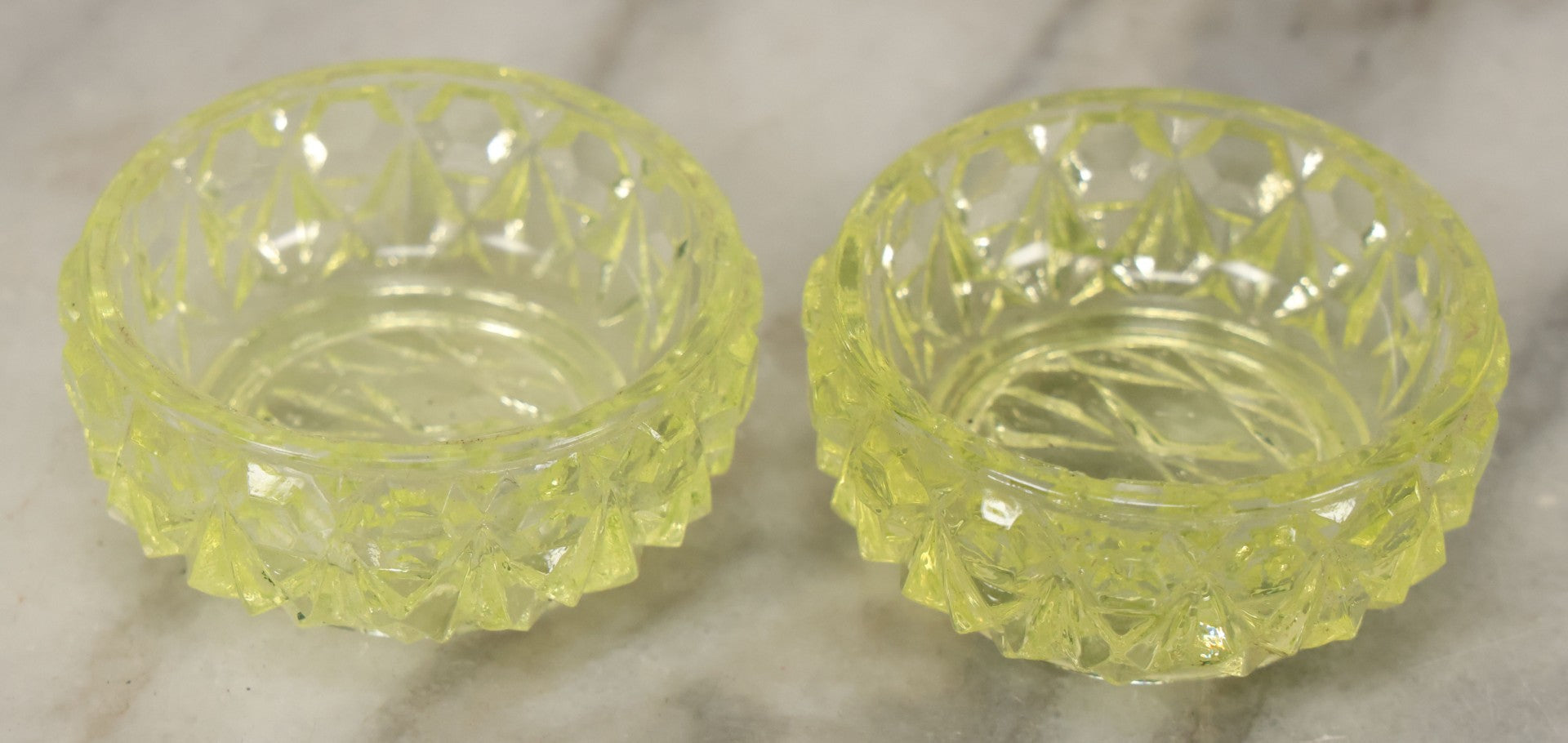 Lot 070 - Pair Of Antique Depression Uranium Vaseline Glass Salt Cellars, Glow Under Blacklight, Note Various Rough Spots, Chipping Around Edges
