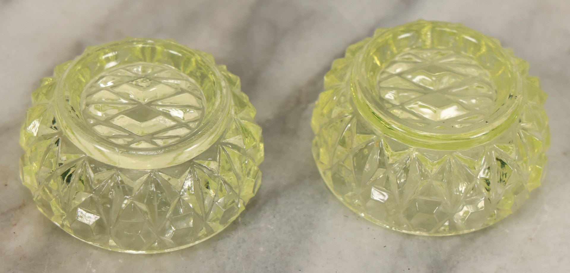 Lot 070 - Pair Of Antique Depression Uranium Vaseline Glass Salt Cellars, Glow Under Blacklight, Note Various Rough Spots, Chipping Around Edges
