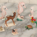 Lot 072 - Miscellaneous Box Lot Grouping Of Glass And Porcelain Animals Including Seahorses, Small Glass Creatures, Plastic Deer, And More, As Found In The Box It Was Found In, Not All Pictured
