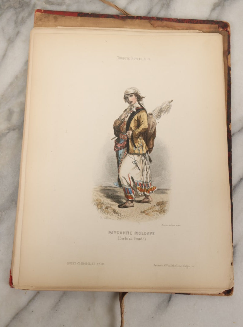 Lot 087 - Antique French Folio Book Of "Costumes Populaires De Diverses Nations (1863), Gaston Hue, Paris, Featuring 20 Hand Colored Lithographs Of The Dress And Costumes Of Various Culture, Mostly In Turkey, Egypt, And Greece, Etc.