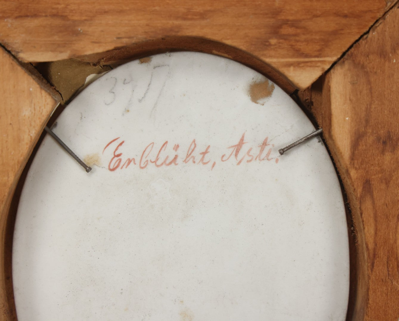 Lot 001 - Fine Antique Hand Painted Porcelain Tile Of Semi-Nude Woman In Ornate Gesso Frame, Marked "Erblüht" ("Blossom") On Verso, After Angelo Asti, Artist Signed Wagner, With Hallmark, 14" x 15-1/2"