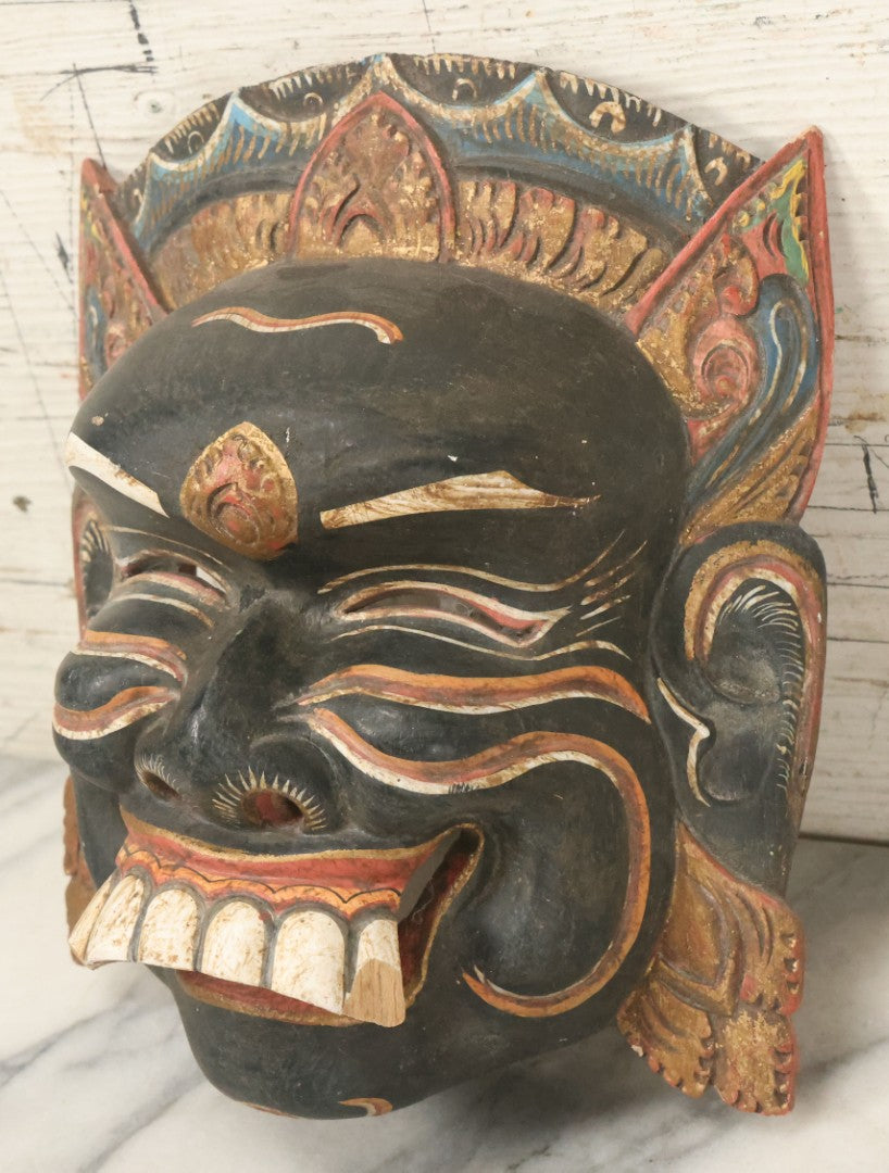 Lot 008 - Vintage Grinning Eastern Mask With Large White Teeth, Hand Carved Wood, Hand Painted, With Wire Hanger, Note Chips To Teeth