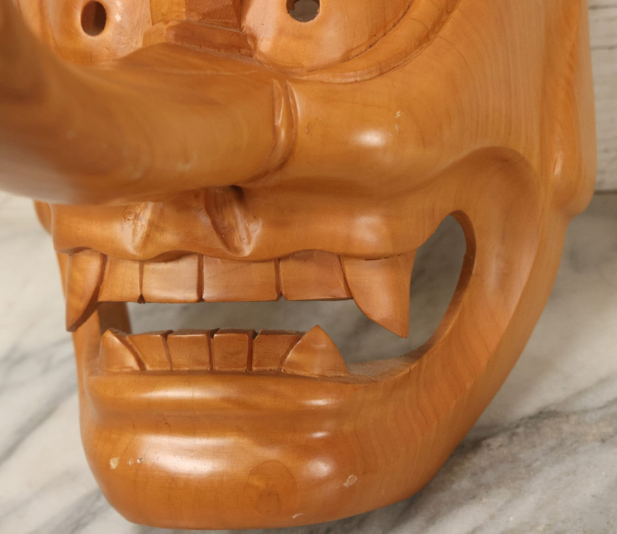 Lot 011 - Contemporary Japanese Hannya Mask With Comically Large Nose, Hand Carved Wood, Unpainted, With Rope Hanger