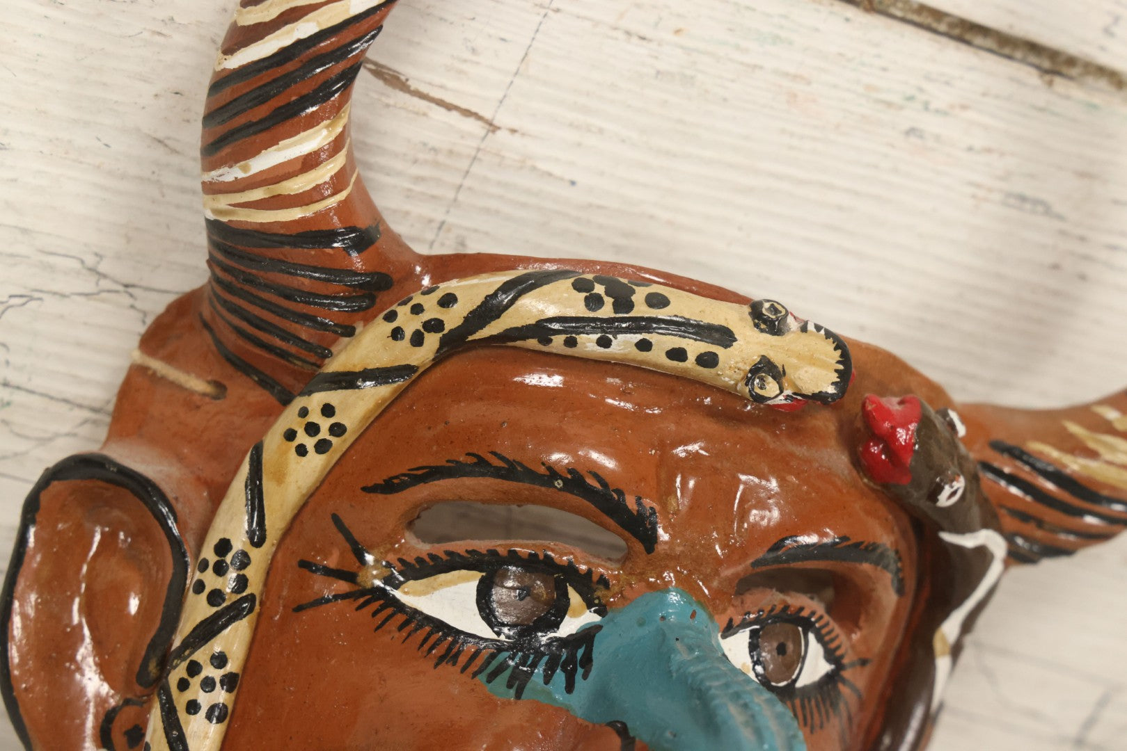 Lot 014 - Vintage Clay Devil Demon Mask With Striped Black And Gold Horns, Snakes Surrounding Face, Fangs, And Blue Nose, Hand Sculpted, Hand Painted, With Rope Hanger