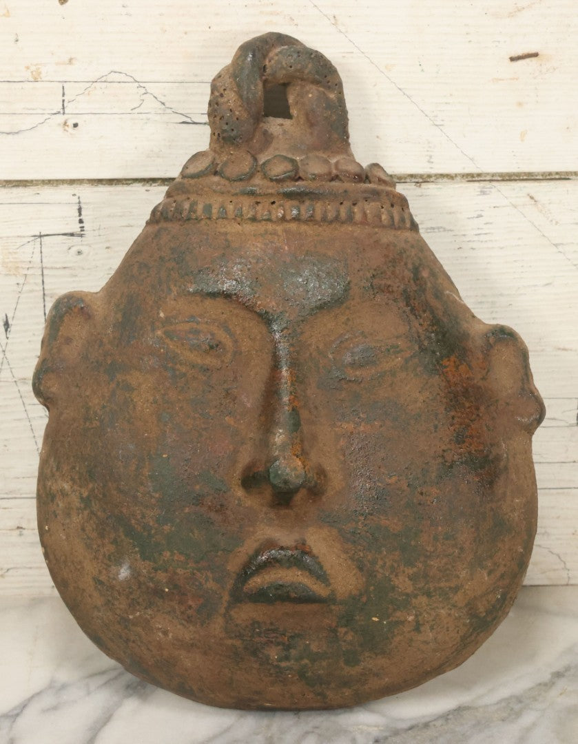 Lot 015 - Vintage Green Clay Eastern Mask With Rotund Face, Sad Expression, Faux-Patina Finish, With Wire Hanger