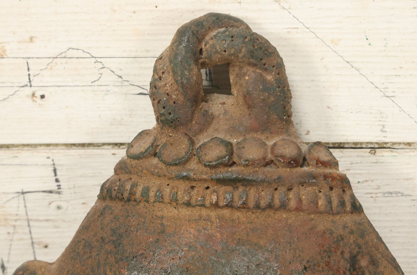 Lot 015 - Vintage Green Clay Eastern Mask With Rotund Face, Sad Expression, Faux-Patina Finish, With Wire Hanger