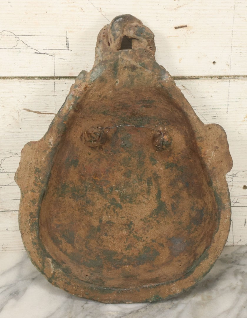 Lot 015 - Vintage Green Clay Eastern Mask With Rotund Face, Sad Expression, Faux-Patina Finish, With Wire Hanger