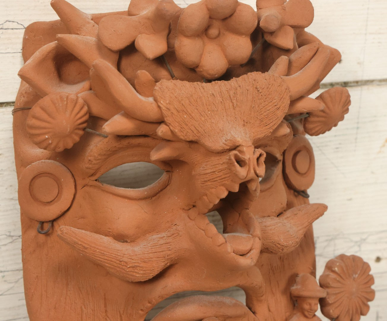 Lot 016 - Vintage Unpainted Red Clay Mexican Folk Art Mask, Made In Mexico Sticker On Verso, With Posable Wire Attached Adornments, With Wire Hanger