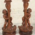 Lot 017 - Pair Of Antique Folk Art Carved Candlesticks With Cherub And Serpent Motif, 9-1/2" Height