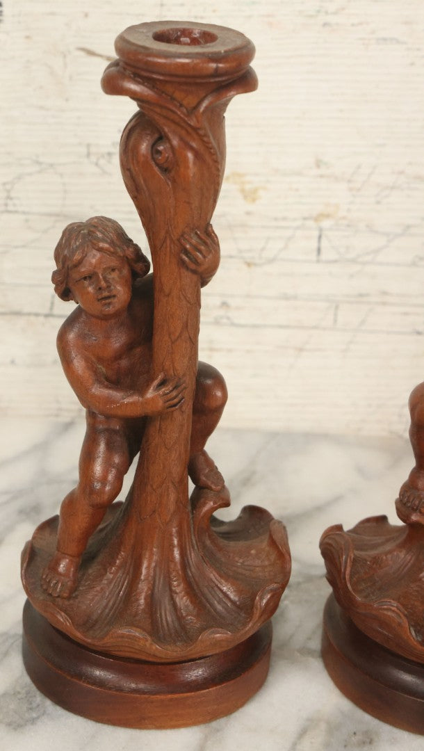 Lot 017 - Pair Of Antique Folk Art Carved Candlesticks With Cherub And Serpent Motif, 9-1/2" Height