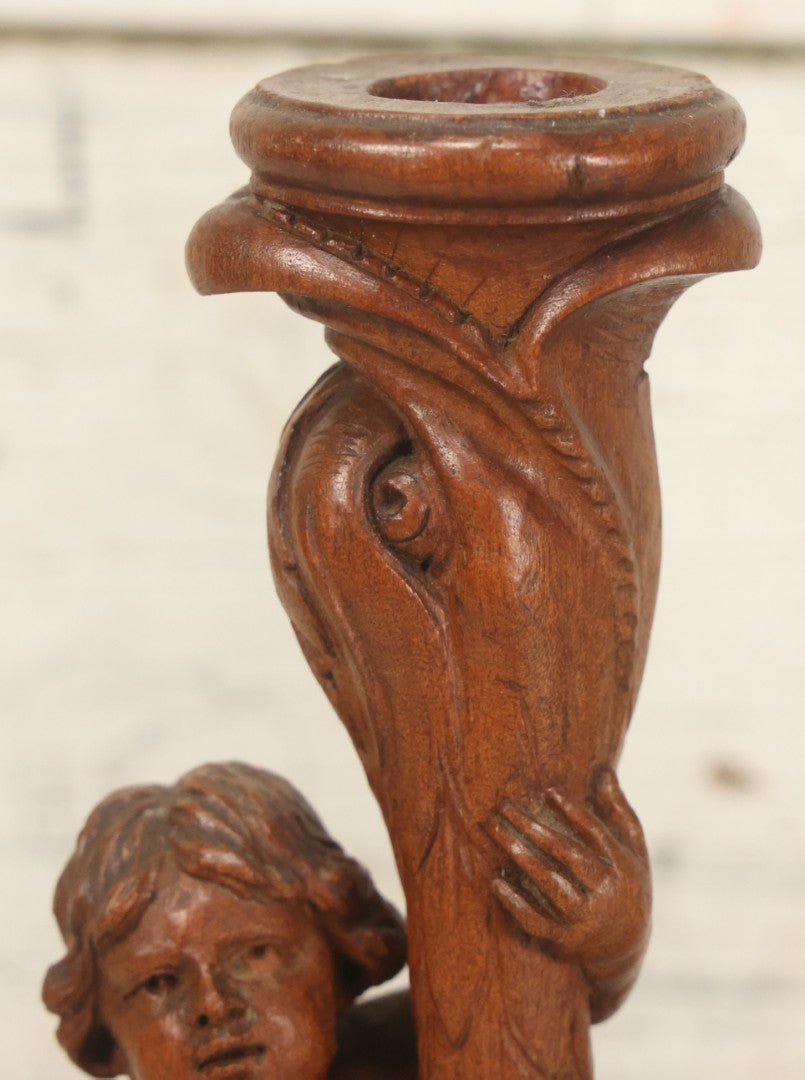 Lot 017 - Pair Of Antique Folk Art Carved Candlesticks With Cherub And Serpent Motif, 9-1/2" Height