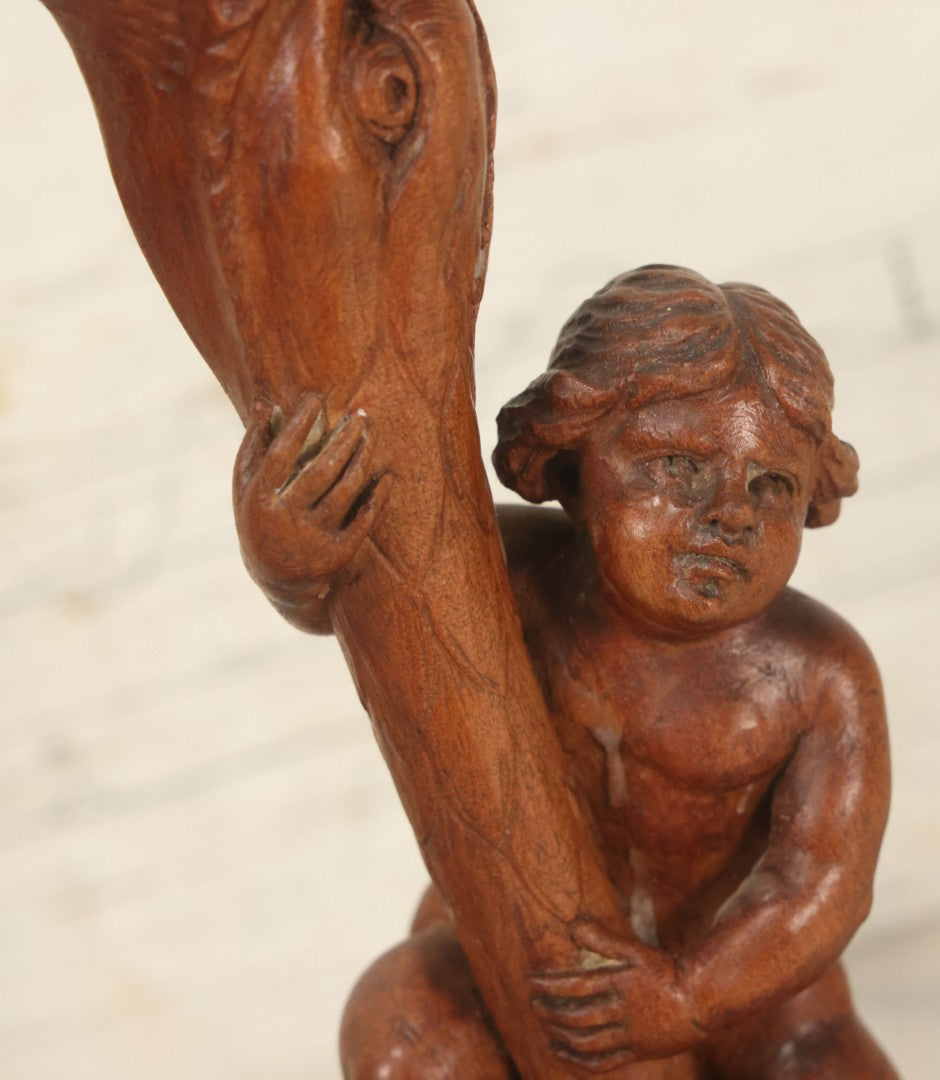 Lot 017 - Pair Of Antique Folk Art Carved Candlesticks With Cherub And Serpent Motif, 9-1/2" Height