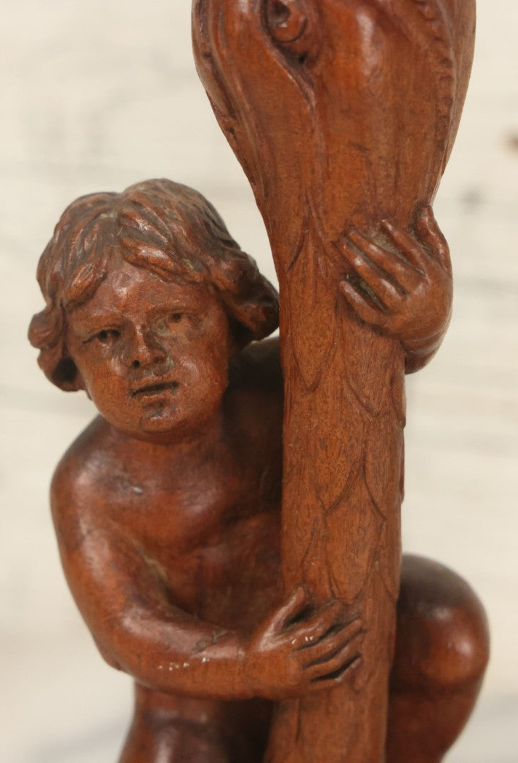 Lot 017 - Pair Of Antique Folk Art Carved Candlesticks With Cherub And Serpent Motif, 9-1/2" Height