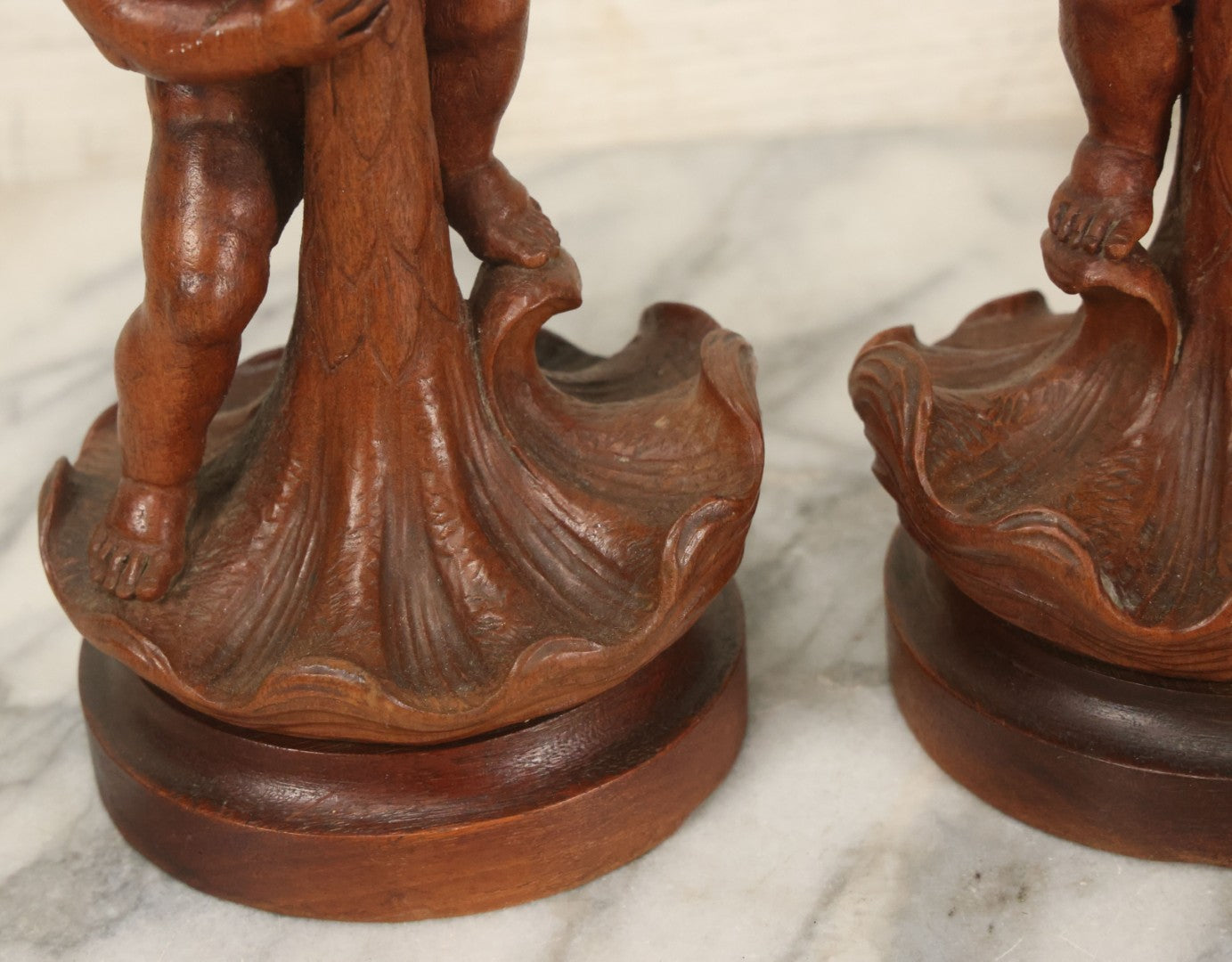 Lot 017 - Pair Of Antique Folk Art Carved Candlesticks With Cherub And Serpent Motif, 9-1/2" Height