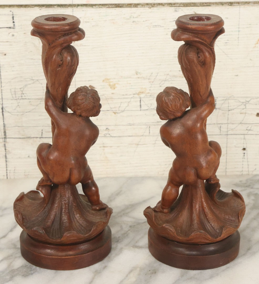 Lot 017 - Pair Of Antique Folk Art Carved Candlesticks With Cherub And Serpent Motif, 9-1/2" Height