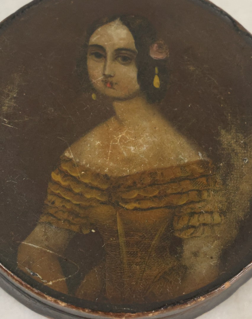 Lot 018 - Antique Hand Painted Lacquered Wooden Dresser Box, With Folk Art Portrait Painting Of Pretty Young Woman In Yellow Dress, 2-3/4" Diameter