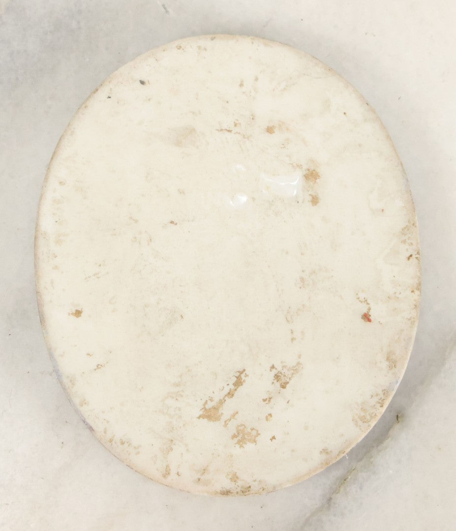 Lot 019 - Antique Miniature Hand Painted Porcelain Cameo Tile With Child In Green Hat With Flowers Hallmarked On Verso, Unmounted, 2" x 2-3/8"