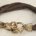 Lot 020 - Antique Victorian Human Hair Work Cuff Bracelet With Brass Adornments, Opening Diameter Approximately 2-3/4"