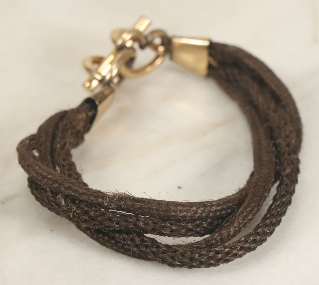 Lot 020 - Antique Victorian Human Hair Work Cuff Bracelet With Brass Adornments, Opening Diameter Approximately 2-3/4"