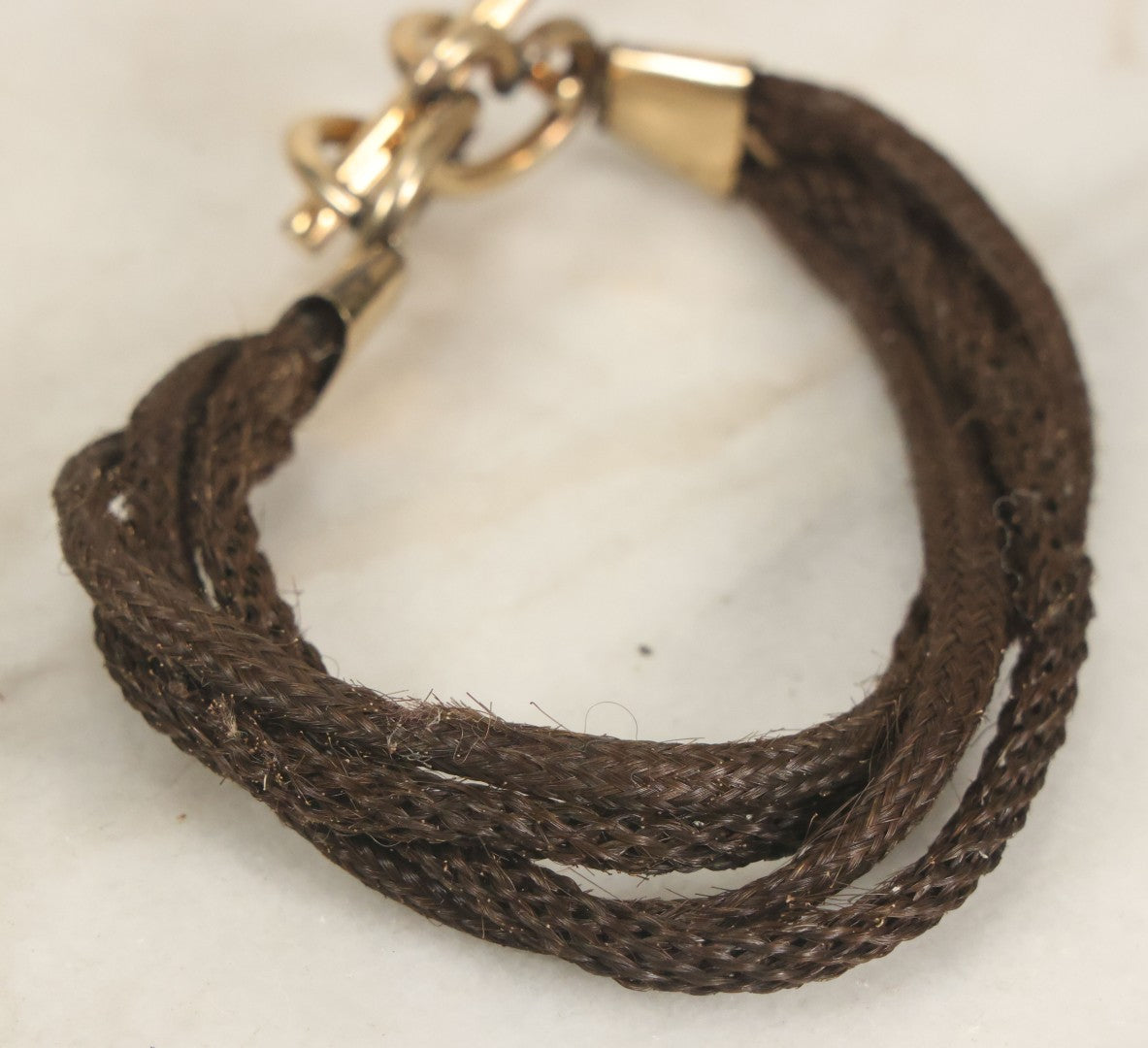 Lot 020 - Antique Victorian Human Hair Work Cuff Bracelet With Brass Adornments, Opening Diameter Approximately 2-3/4"