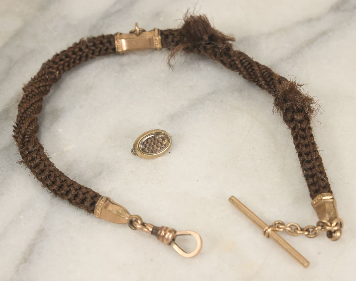 Lot 022 - Pair Of Antique Victorian Human Hair Work Jewelry Pieces, Craft Grade, Poor Condition, Including Watch Chain And Brooch, Note Heavy Wear