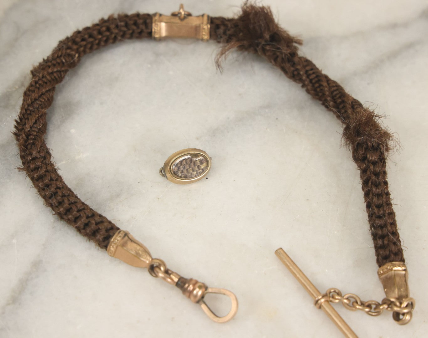 Lot 022 - Pair Of Antique Victorian Human Hair Work Jewelry Pieces, Craft Grade, Poor Condition, Including Watch Chain And Brooch, Note Heavy Wear