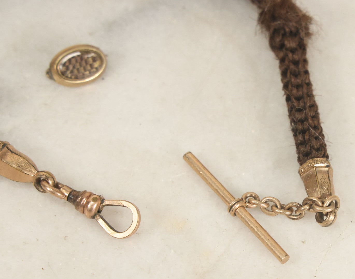 Lot 022 - Pair Of Antique Victorian Human Hair Work Jewelry Pieces, Craft Grade, Poor Condition, Including Watch Chain And Brooch, Note Heavy Wear