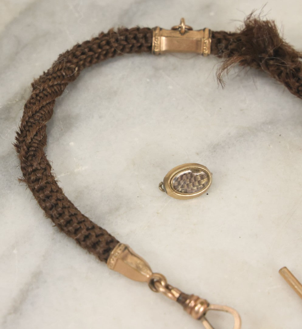 Lot 022 - Pair Of Antique Victorian Human Hair Work Jewelry Pieces, Craft Grade, Poor Condition, Including Watch Chain And Brooch, Note Heavy Wear