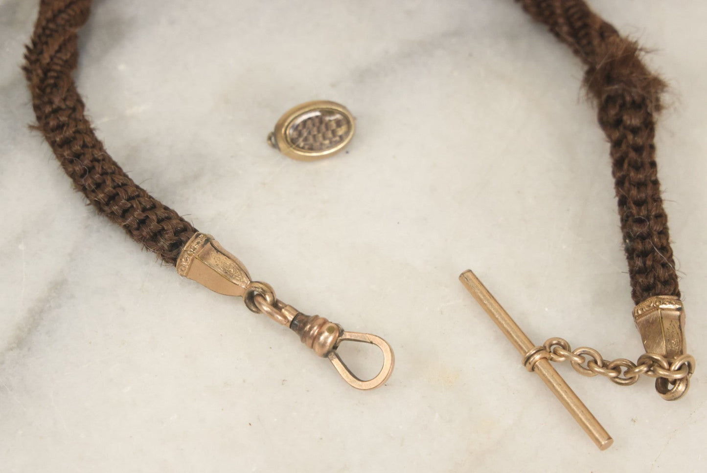 Lot 022 - Pair Of Antique Victorian Human Hair Work Jewelry Pieces, Craft Grade, Poor Condition, Including Watch Chain And Brooch, Note Heavy Wear