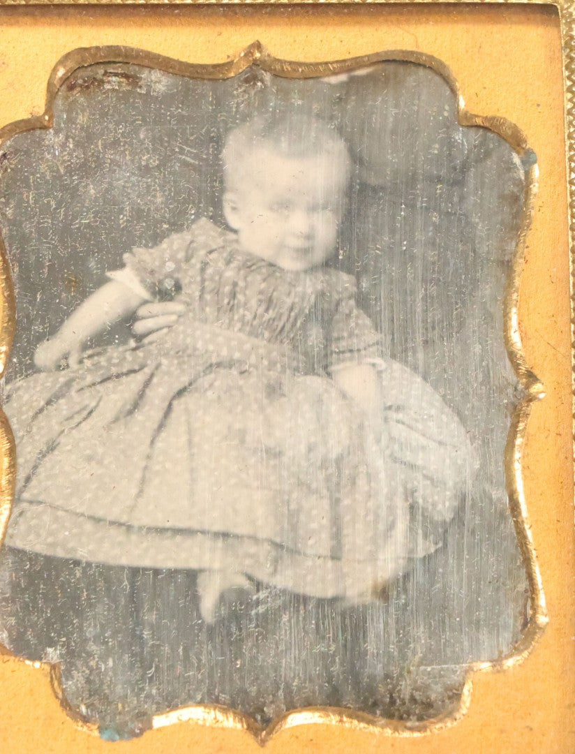Lot 025 - Antique 1/9th Plate Daguerreotype Photograph Of Baby Held By "Not-So-Hidden" Mother, Note Hand On Baby's Waist, In Half Leatherette Union Case