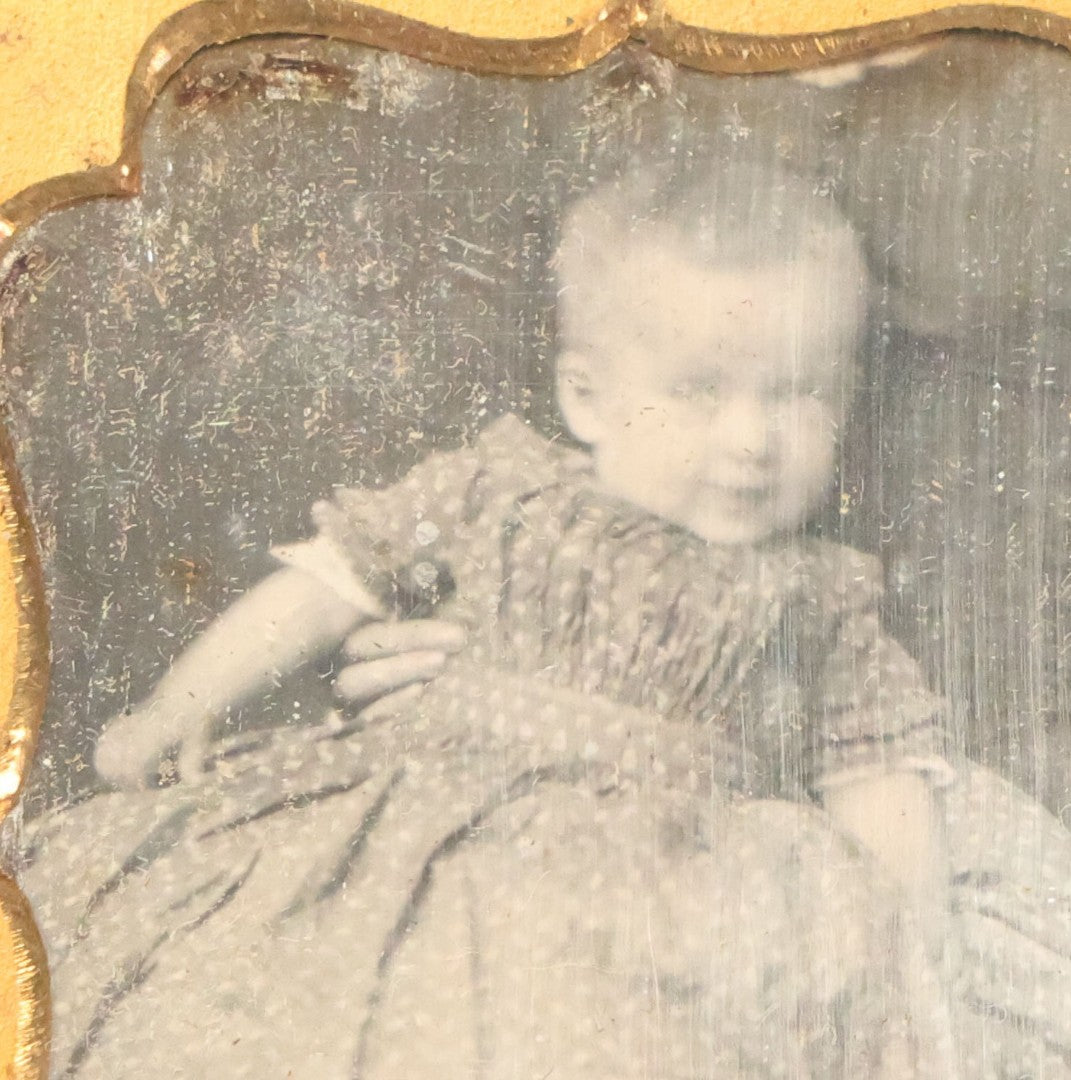 Lot 025 - Antique 1/9th Plate Daguerreotype Photograph Of Baby Held By "Not-So-Hidden" Mother, Note Hand On Baby's Waist, In Half Leatherette Union Case