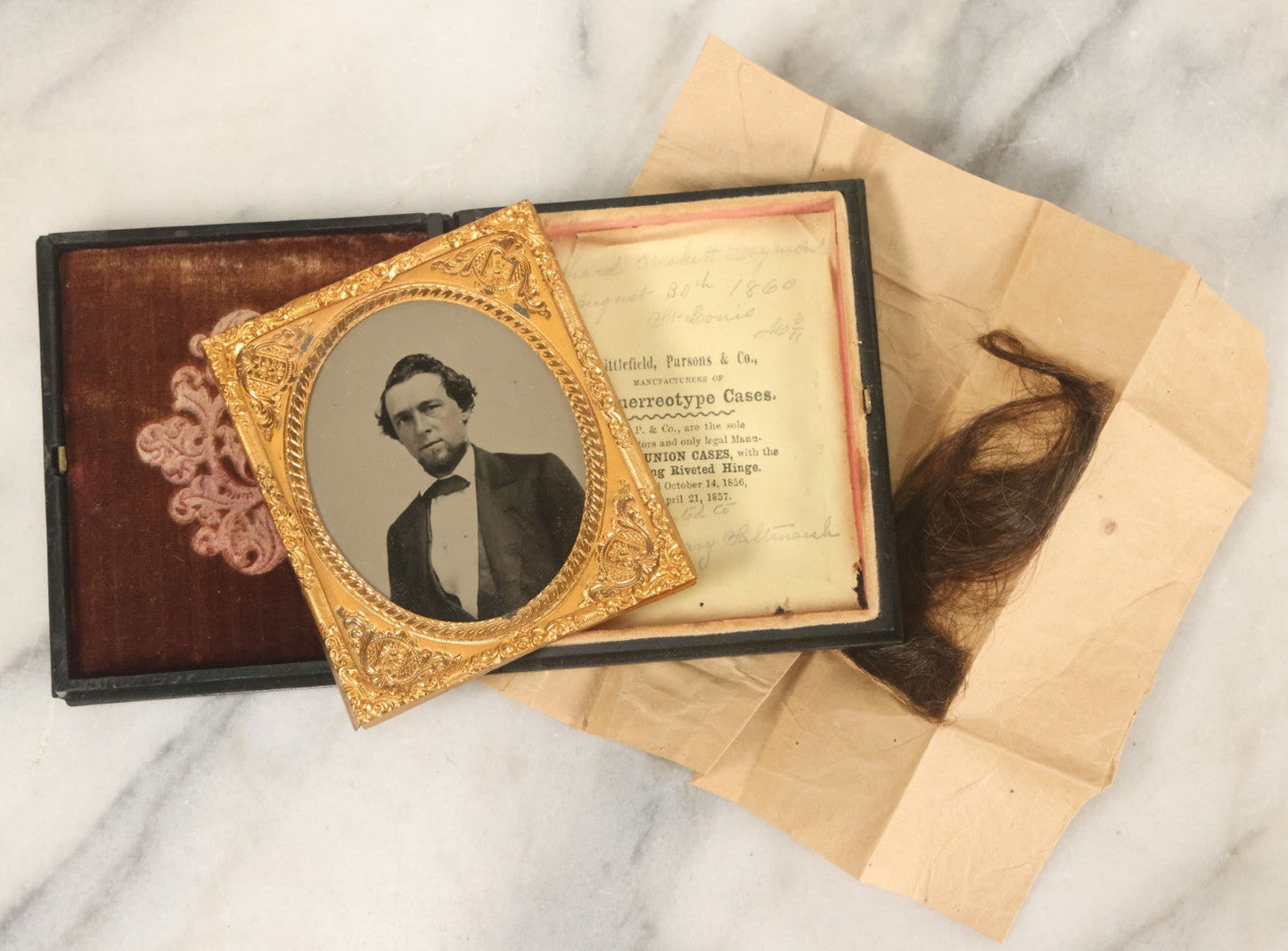 Lot 026 - Antique 1/6th Plate Ruby Ambrotype Photograph Of Richard Sackett Raymond, Born 1860, St. Louis, Missouri, With Lock Of Richard's Hair, Presented To Mary Saltmarsh, In Thermoplastic Case By Littlefield, Parsons & Co., As Found