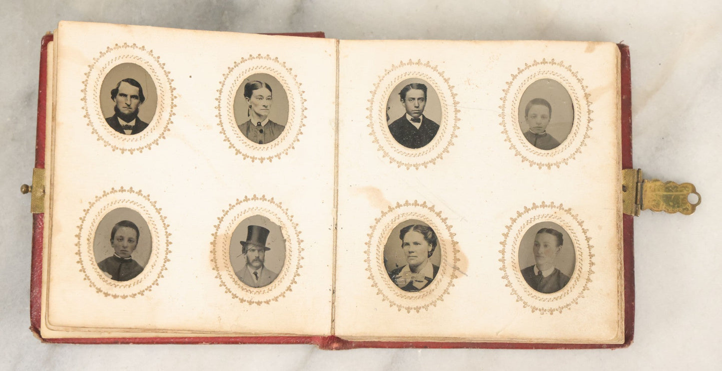 Lot 028 - Antique Red Covered Gem Tintype Photo Album, With 64 Gem Tintype Photographs Including Man In Fur Hat, Man In Top Hat, And Many Women And Children (All Pages Pictured)