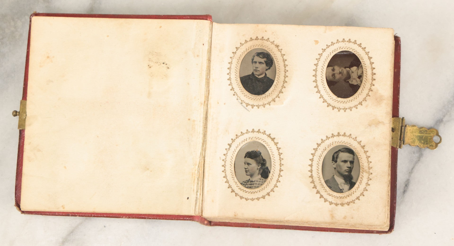 Lot 028 - Antique Red Covered Gem Tintype Photo Album, With 64 Gem Tintype Photographs Including Man In Fur Hat, Man In Top Hat, And Many Women And Children (All Pages Pictured)