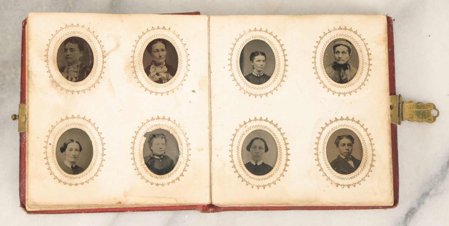 Lot 028 - Antique Red Covered Gem Tintype Photo Album, With 64 Gem Tintype Photographs Including Man In Fur Hat, Man In Top Hat, And Many Women And Children (All Pages Pictured)