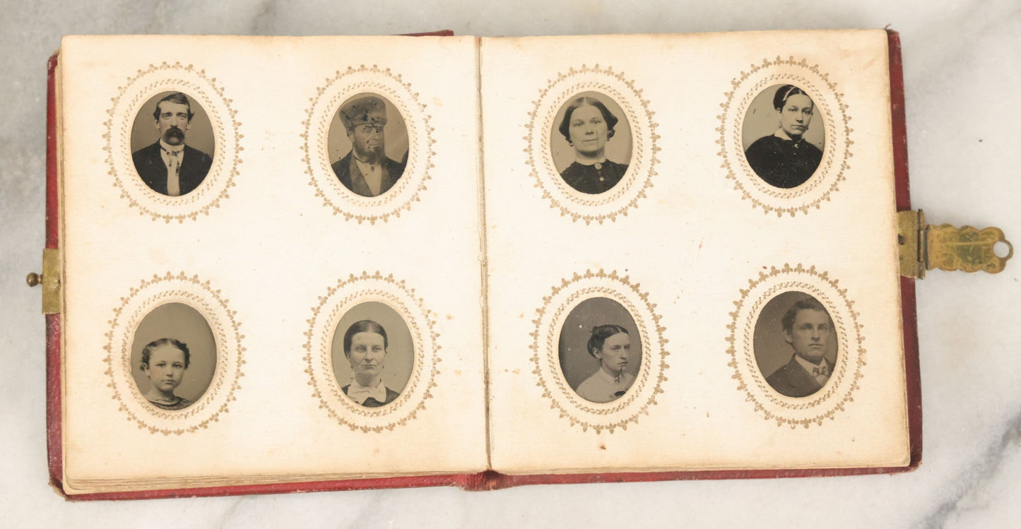 Lot 028 - Antique Red Covered Gem Tintype Photo Album, With 64 Gem Tintype Photographs Including Man In Fur Hat, Man In Top Hat, And Many Women And Children (All Pages Pictured)