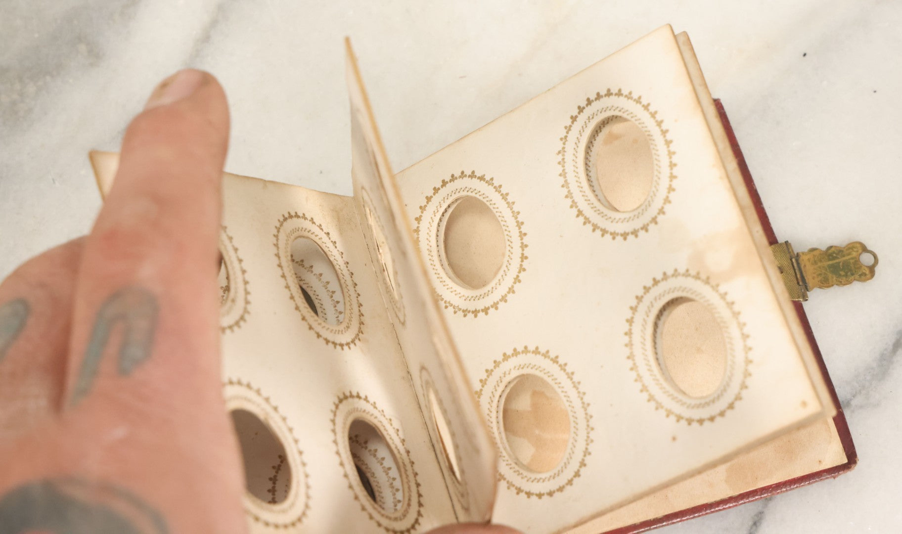 Lot 028 - Antique Red Covered Gem Tintype Photo Album, With 64 Gem Tintype Photographs Including Man In Fur Hat, Man In Top Hat, And Many Women And Children (All Pages Pictured)