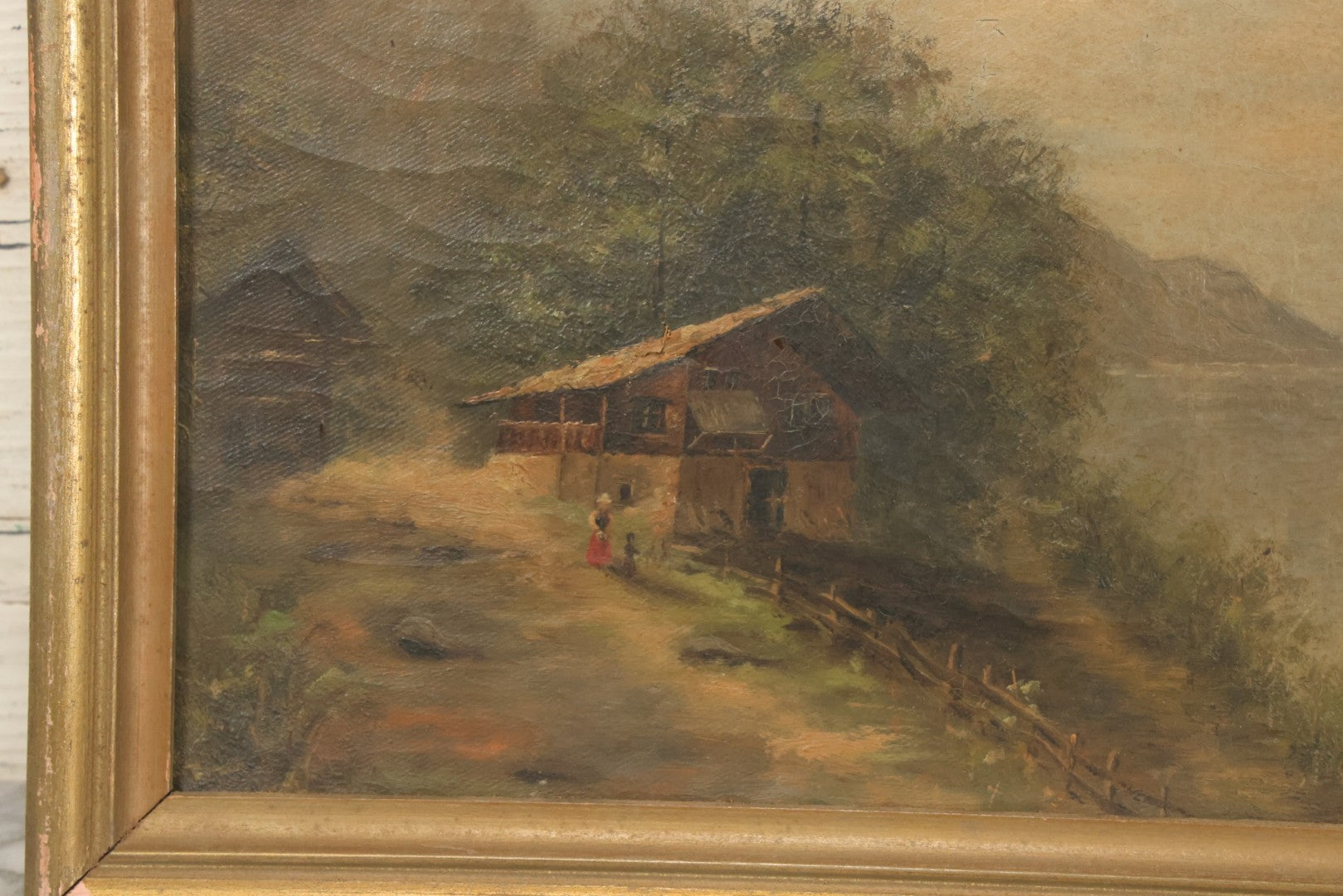 Lot 032 - Antique Oil On Canvas Country Landscape Painting Of Cabin By Lakeside With Mountains In Distance, Mother And Child In Scene, Unsigned, Note Holes And Losses, In Frame, 13-3/4" x 9-5/8"