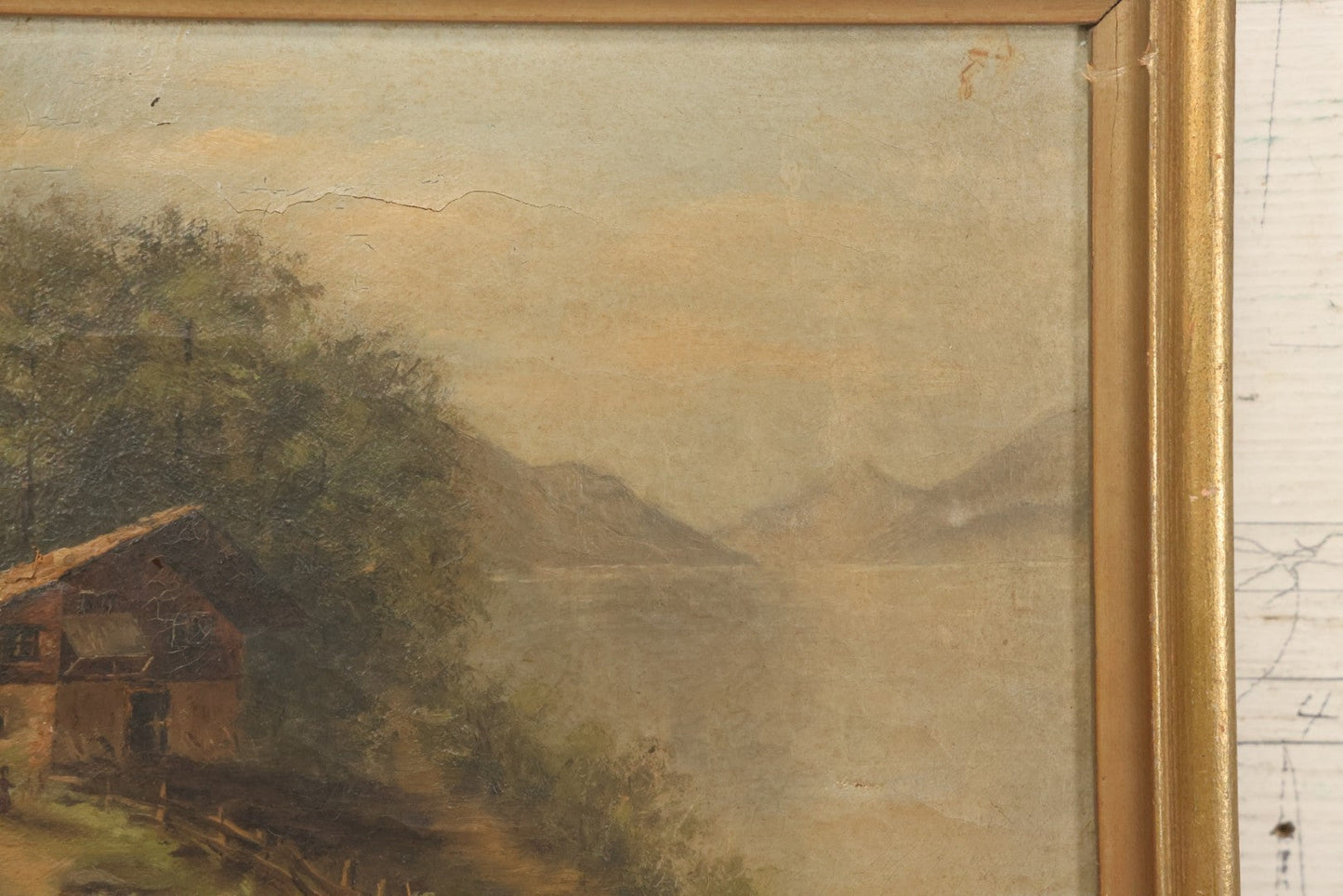 Lot 032 - Antique Oil On Canvas Country Landscape Painting Of Cabin By Lakeside With Mountains In Distance, Mother And Child In Scene, Unsigned, Note Holes And Losses, In Frame, 13-3/4" x 9-5/8"