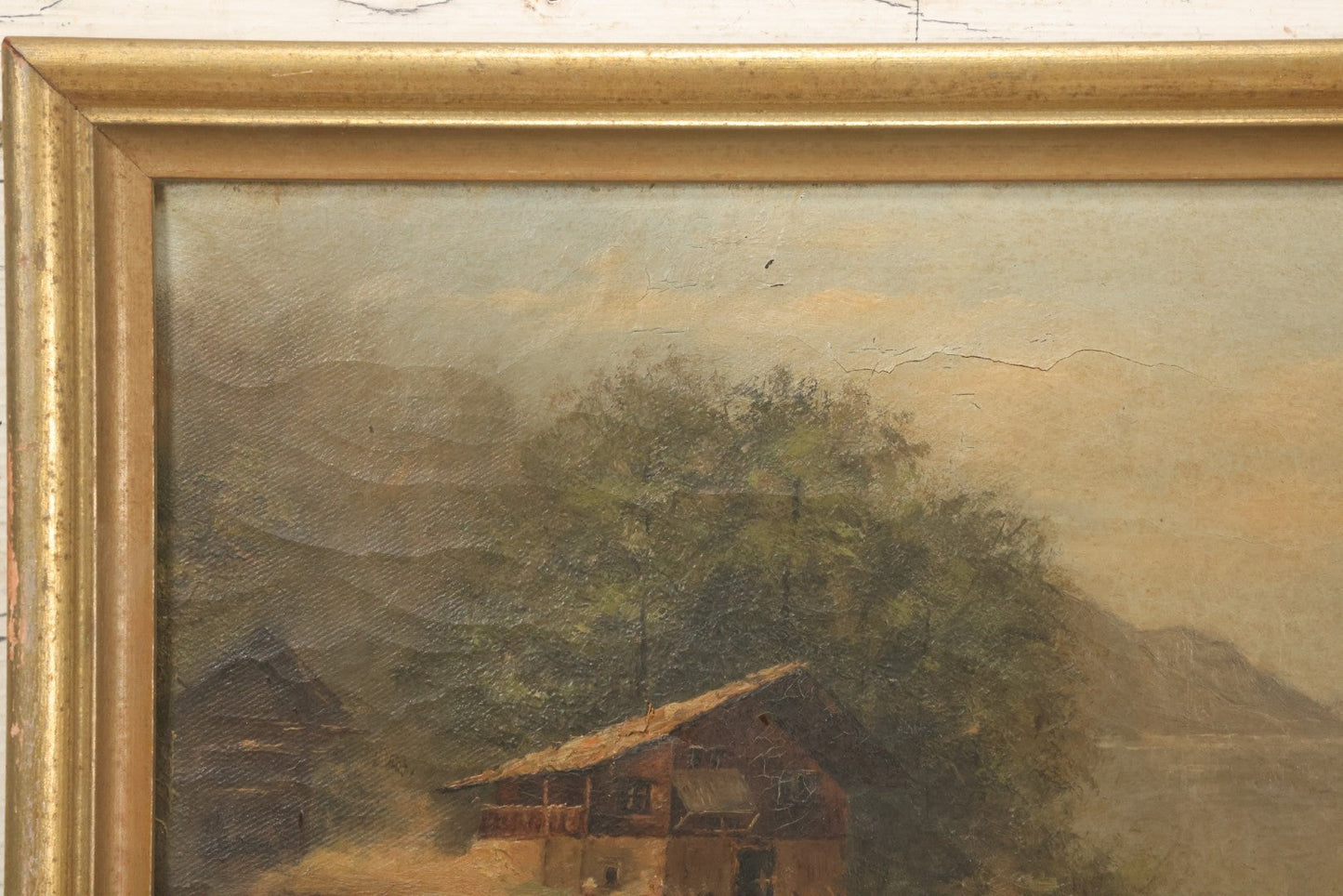 Lot 032 - Antique Oil On Canvas Country Landscape Painting Of Cabin By Lakeside With Mountains In Distance, Mother And Child In Scene, Unsigned, Note Holes And Losses, In Frame, 13-3/4" x 9-5/8"