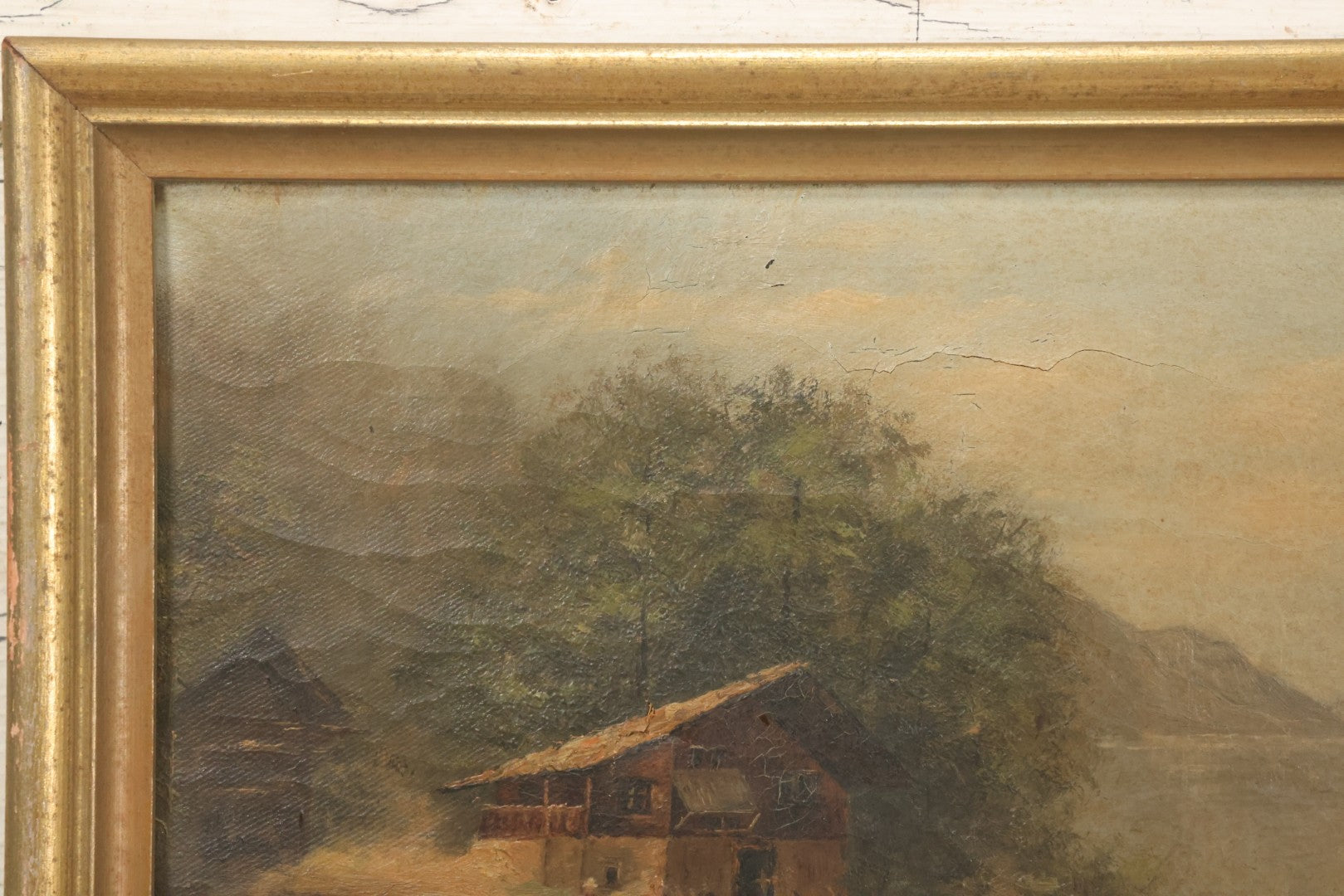 Lot 032 - Antique Oil On Canvas Country Landscape Painting Of Cabin By Lakeside With Mountains In Distance, Mother And Child In Scene, Unsigned, Note Holes And Losses, In Frame, 13-3/4" x 9-5/8"