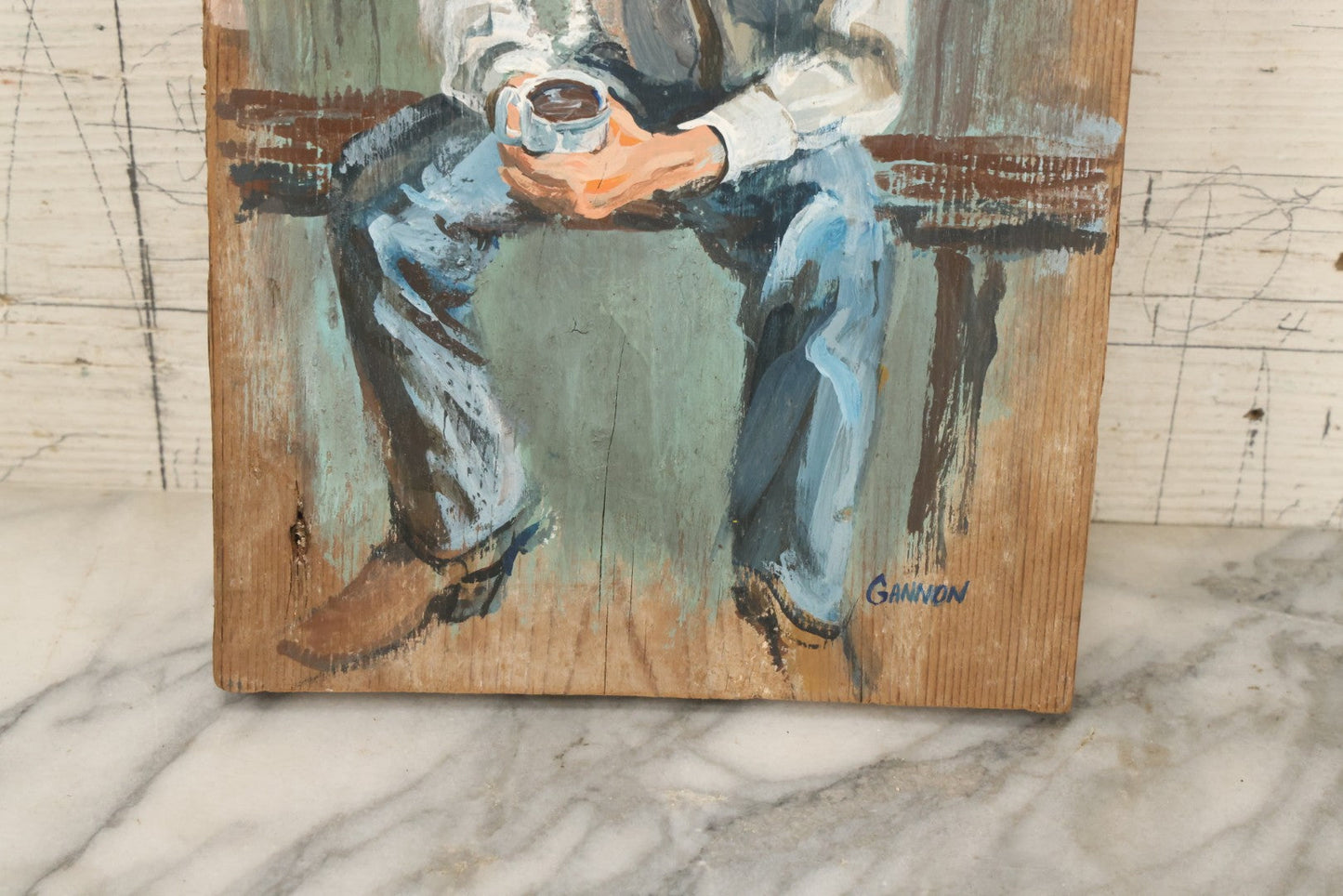 Lot 033 - Vintage Painting On Wood Panel Of Cowboy Drinking Coffee, Artist Signed Gannon, 8" x 13-1/2"
